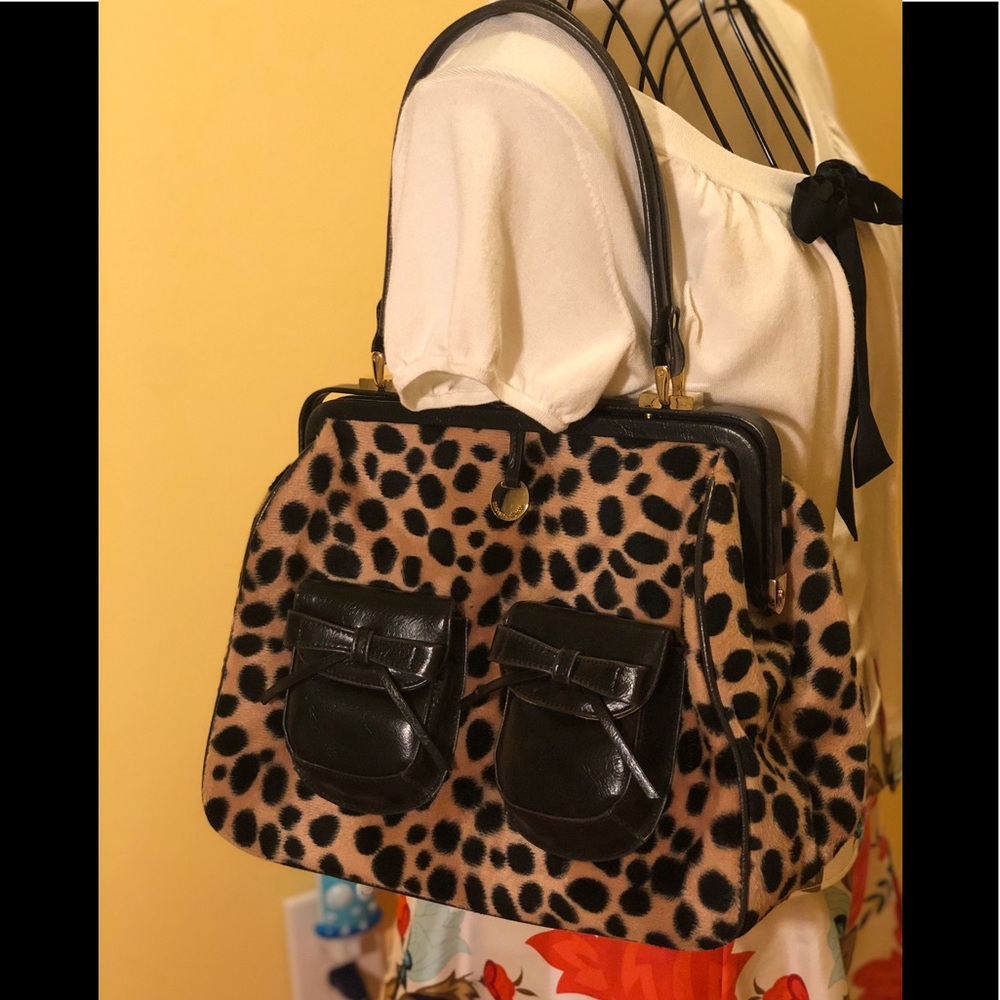 NECESSARY OBJECTS Faux leopard Fur Satchel.